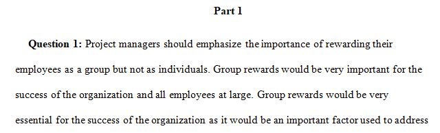 Why should a project manager emphasize group rewards over individual rewards?